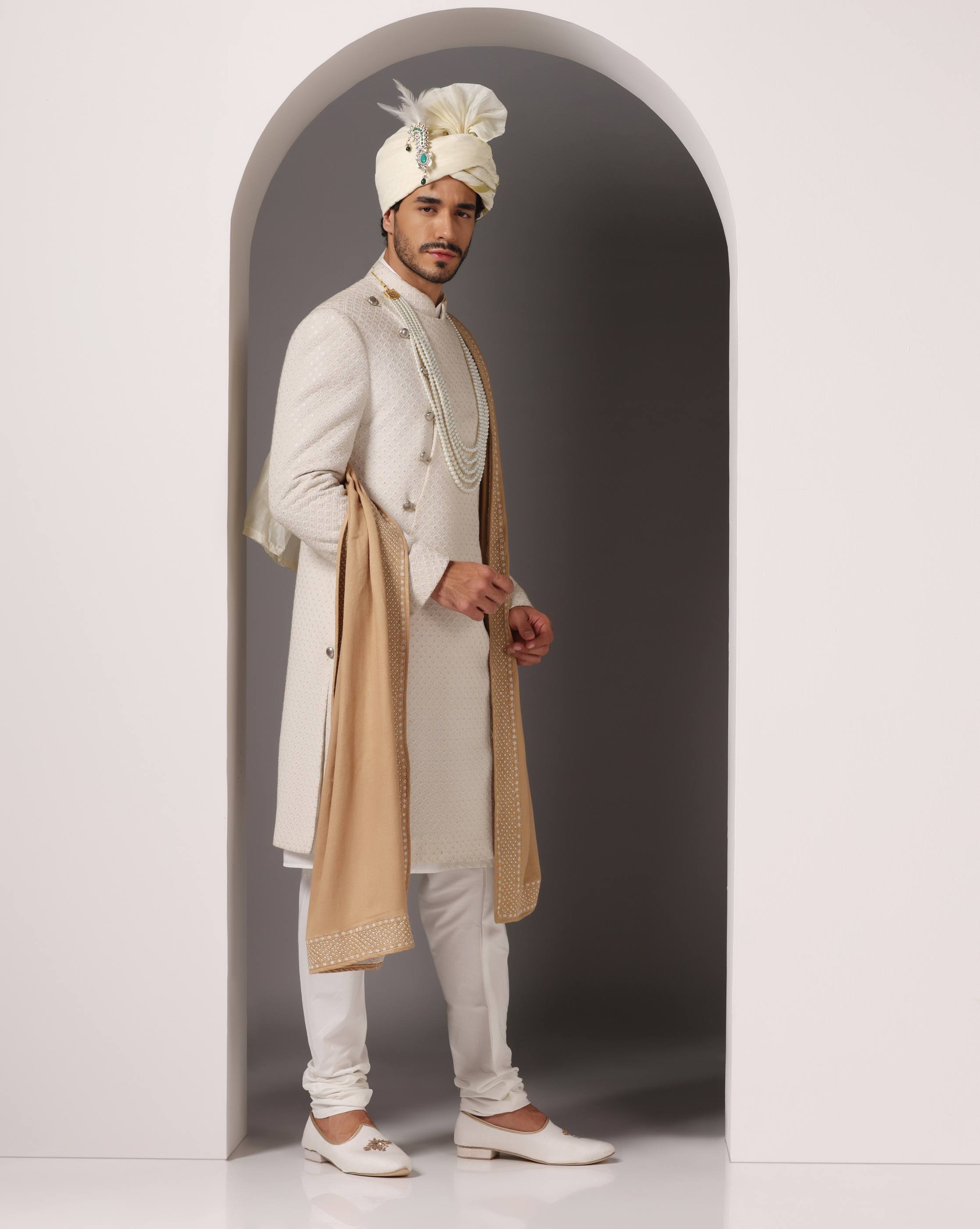 Elegance Redefined: Ivory Lukhnawi C-Cut Sherwani