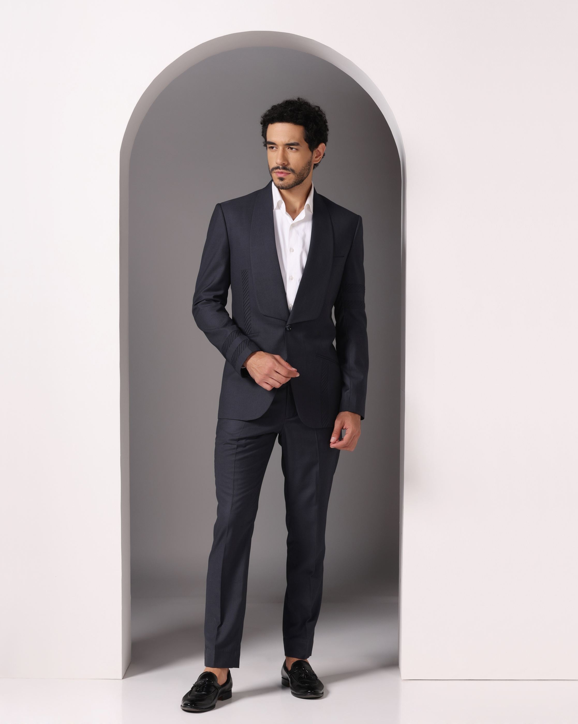 Sapphire Sophistication: Dark Grey Suit with Pintuck Detailing and Tux Lapel