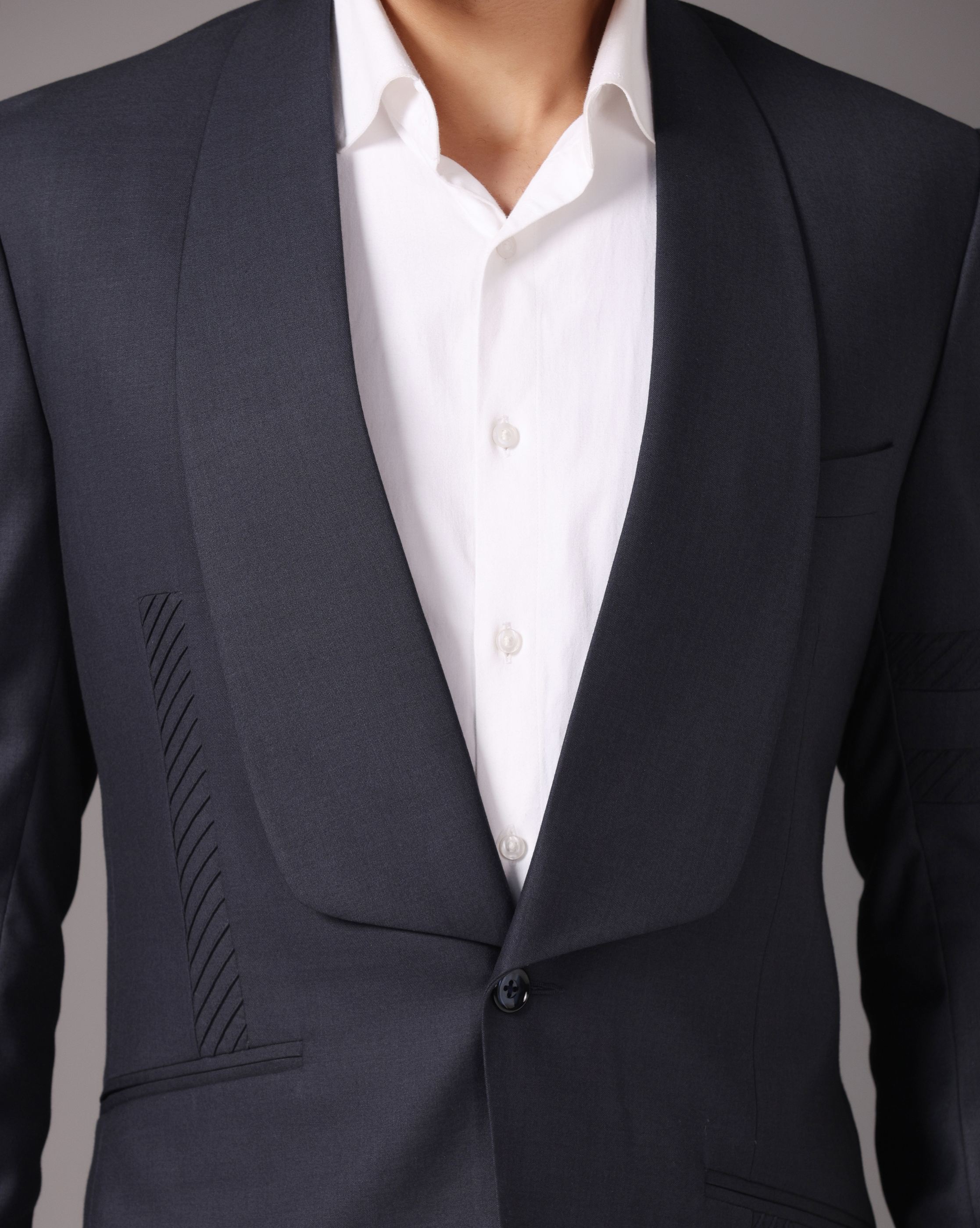 Sapphire Sophistication: Dark Grey Suit with Pintuck Detailing and Tux Lapel