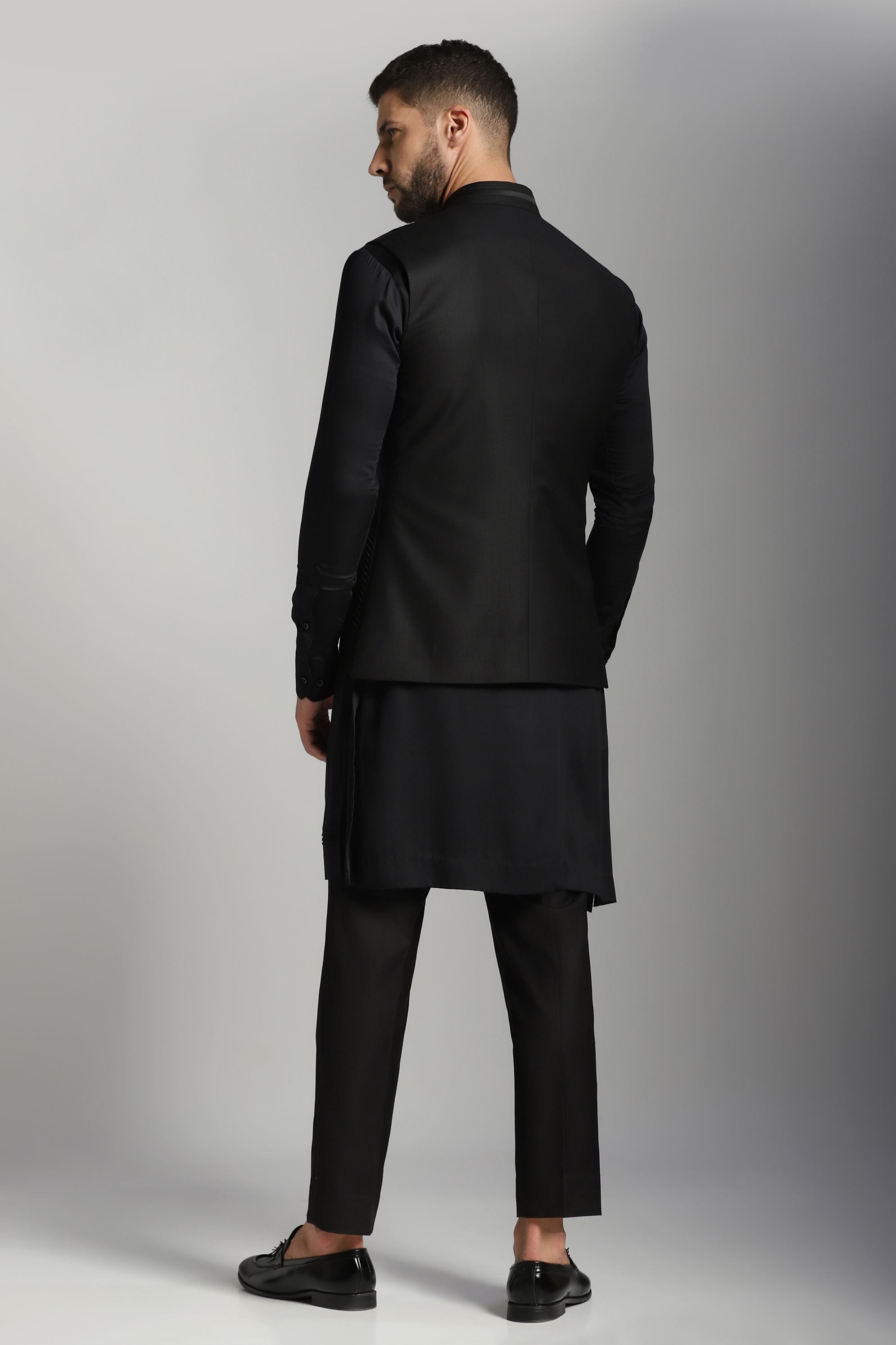 Classic Noir Ensemble: Black Pintucks Nehru Jacket paired with Kurta and Trouser