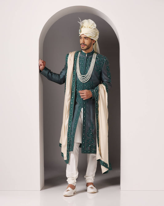 Forest green threadwork groom sherwani for baraat | Bhavya Bhasin Couture