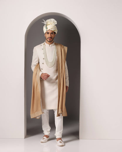 Lukhnawi Zareen Khat ivory C-cut groom sherwani with Zari work | Bhavya Bhasin Couture