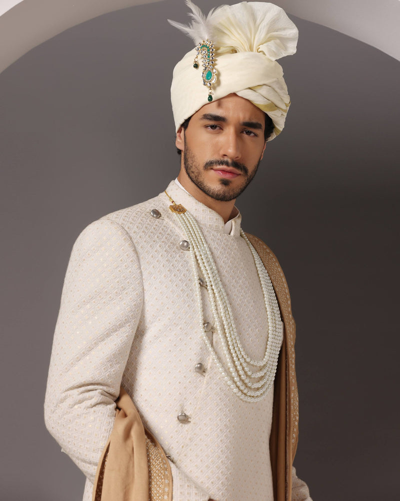 Elegance Redefined: Ivory Lukhnawi C-Cut Sherwani