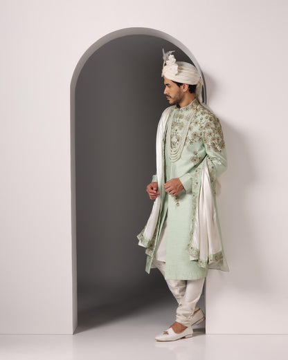 Shahi Zar green groom sherwani three-quarter view | Bhavya Bhasin Couture