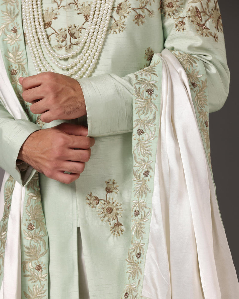 Regal Radiance: Pista Green Sherwani with Zari and Dabka Embellishments