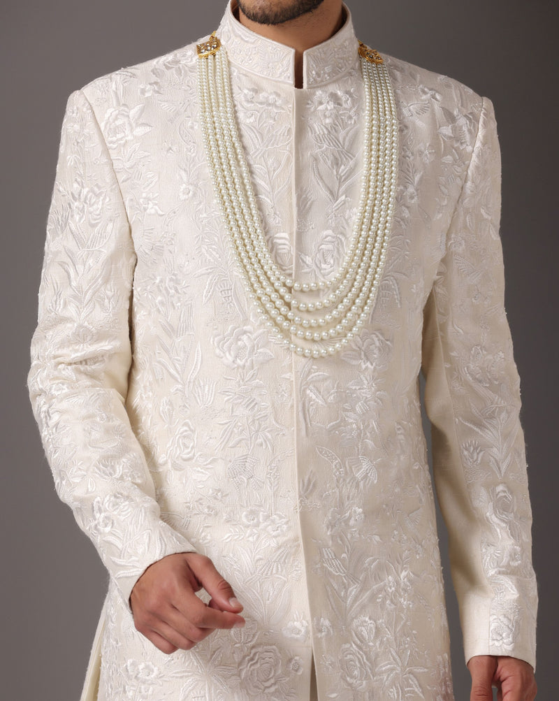 Ivory Grandeur: Sherwani with Subtle Tone-on-Tone Work and Handcrafted Embellishments