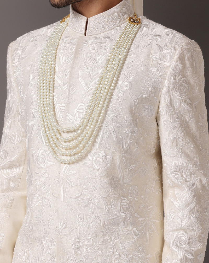 Ivory Grandeur: Sherwani with Subtle Tone-on-Tone Work and Handcrafted Embellishments