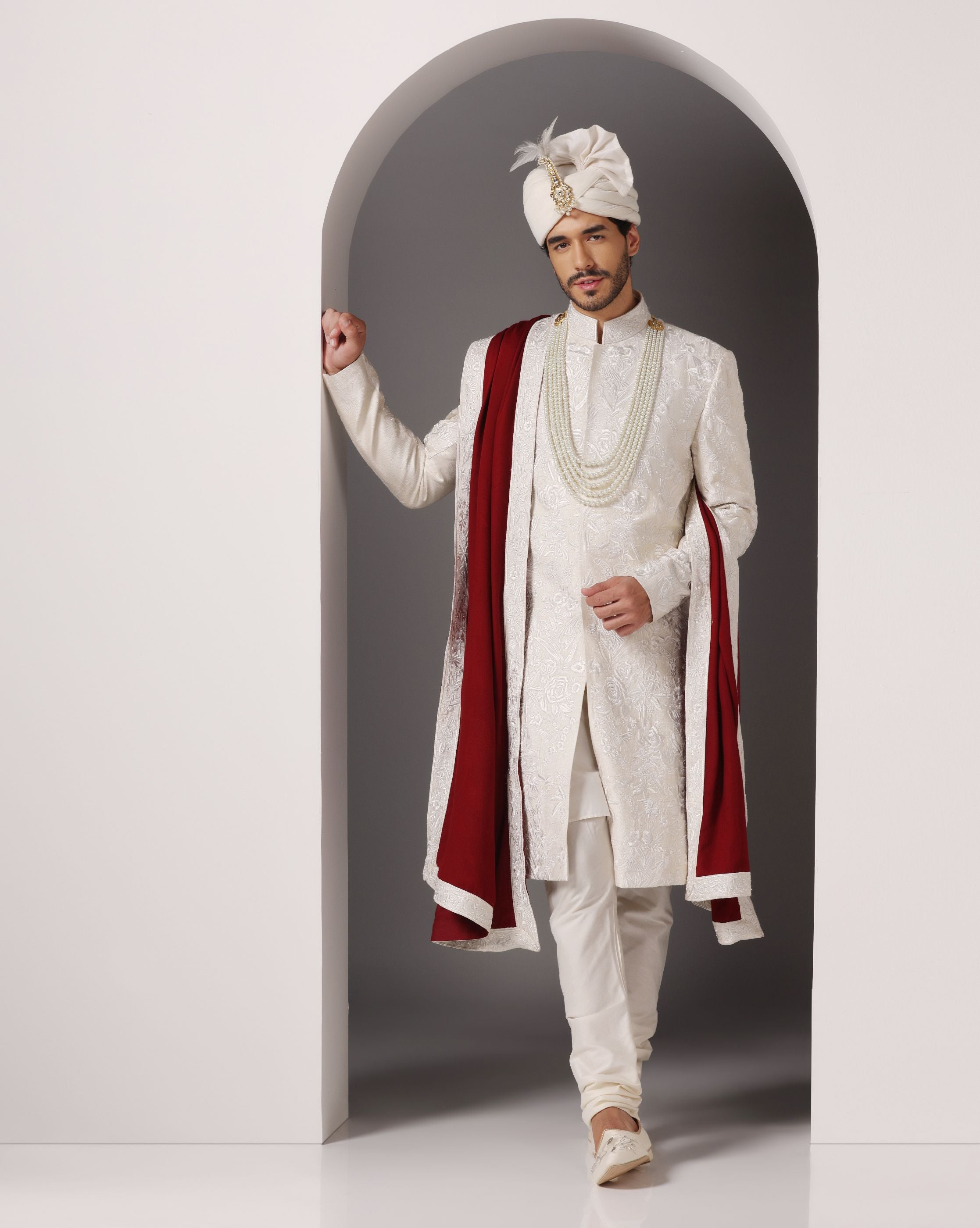 Ivory Grandeur: Sherwani with Subtle Tone-on-Tone Work and Handcrafted Embellishments