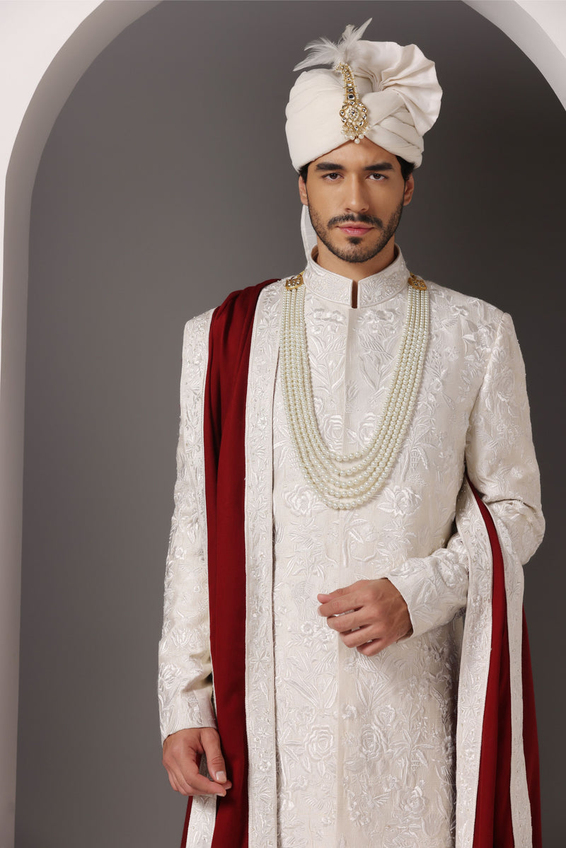 Ivory Grandeur: Sherwani with Subtle Tone-on-Tone Work and Handcrafted Embellishments
