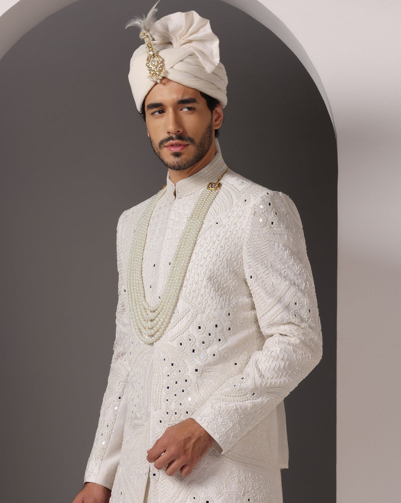 Ivory Opulence: Sherwani with Exquisite Hand Embroidery, Cutdaana, and Pearls