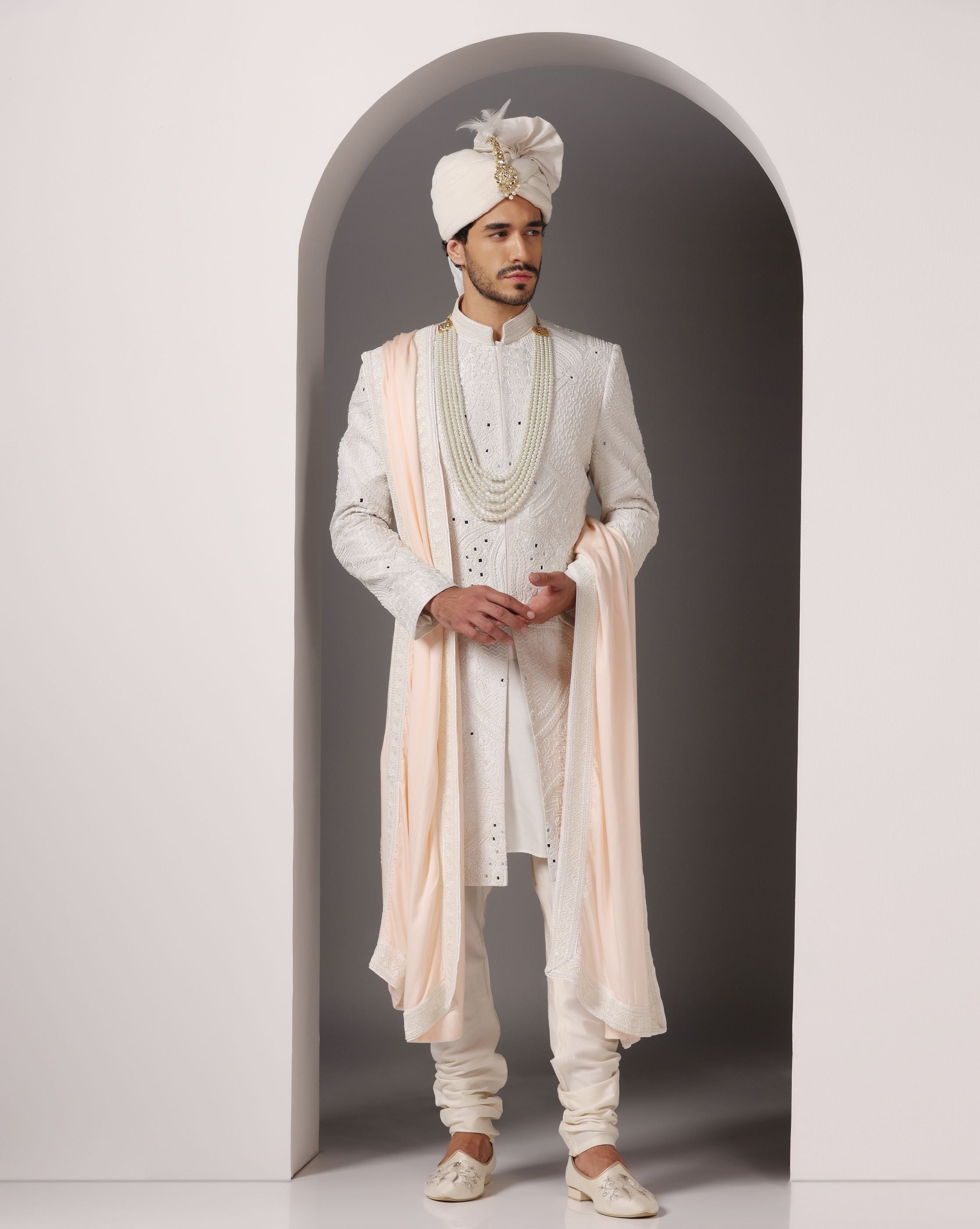 Ivory opulence sherwani Cutdaana pearls hand embroidery | Bhavya Bhasin Couture