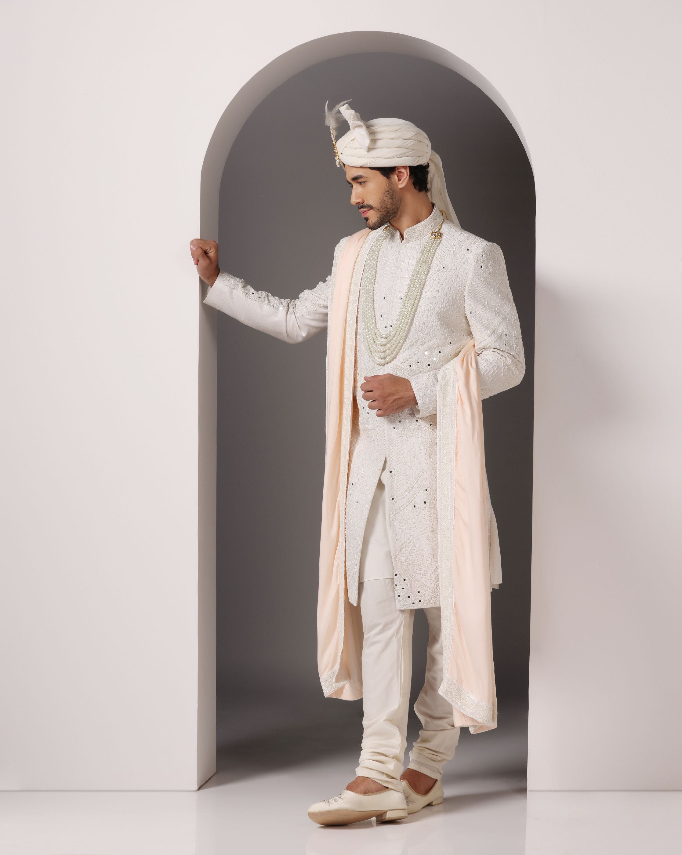 Ivory Opulence: Sherwani with Exquisite Hand Embroidery, Cutdaana, and Pearls