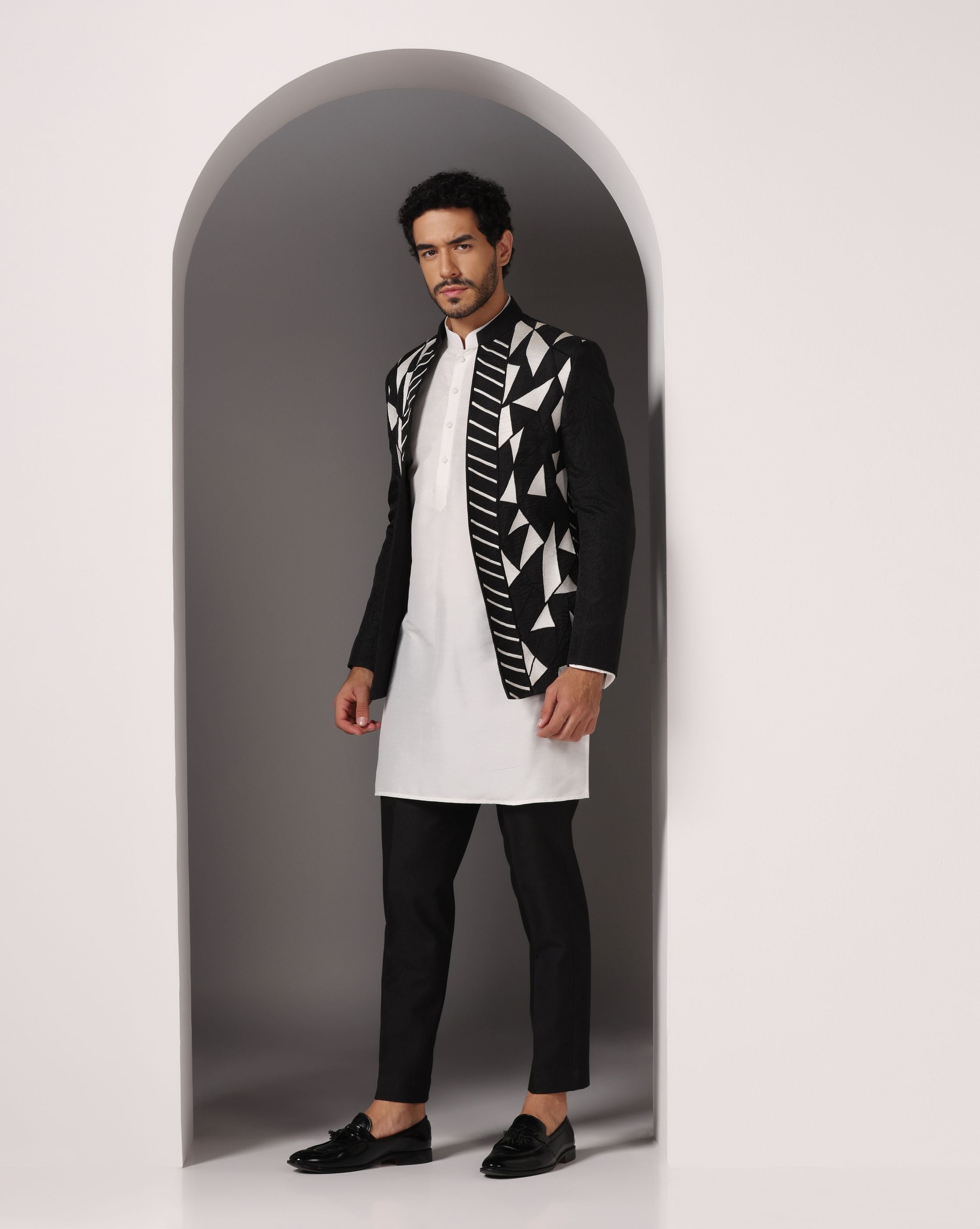 Monochrome Chic: Black Jacket with Thread Embroidery, White Kurta, and Pants