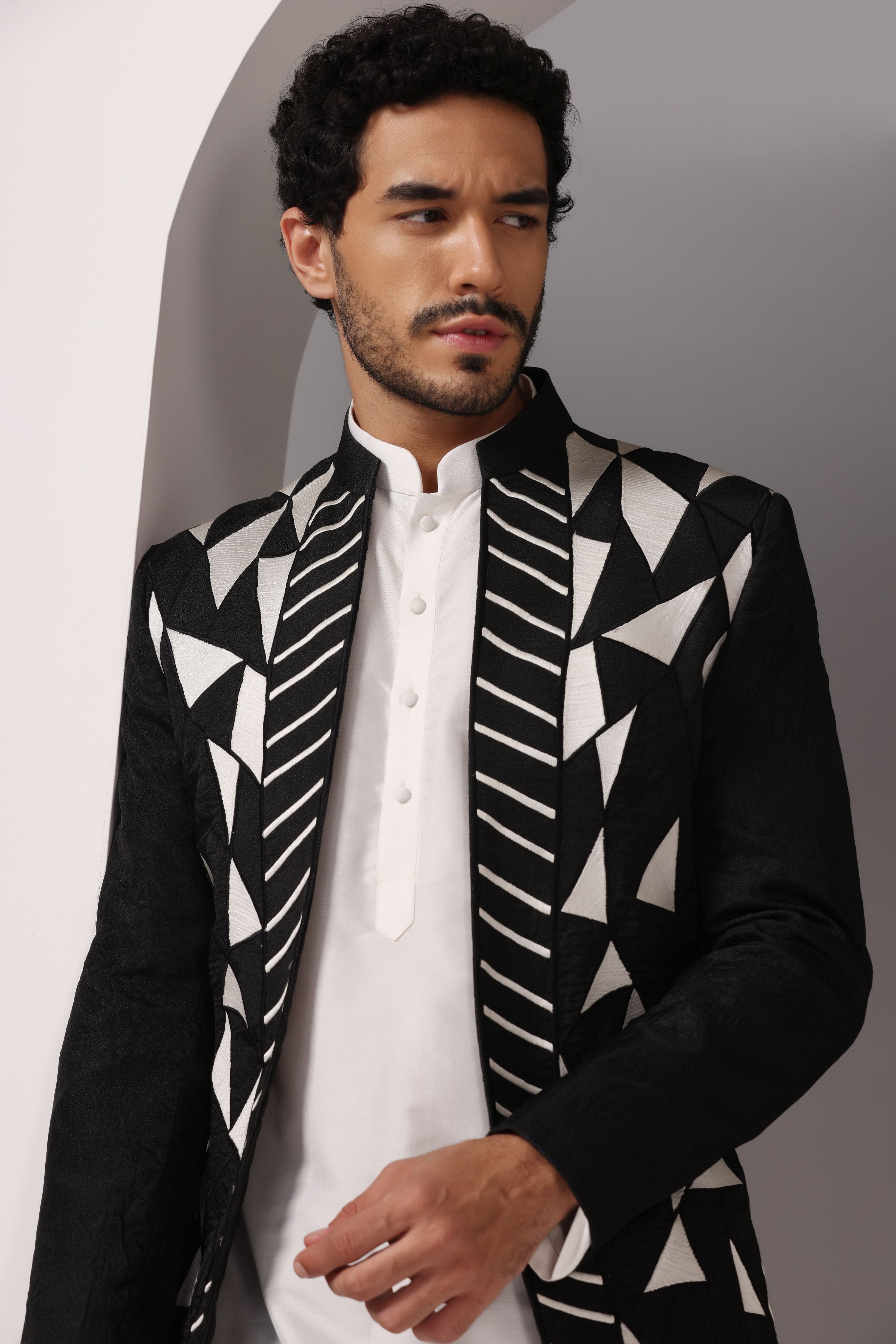 Monochrome Chic: Black Jacket with Thread Embroidery, White Kurta, and Pants