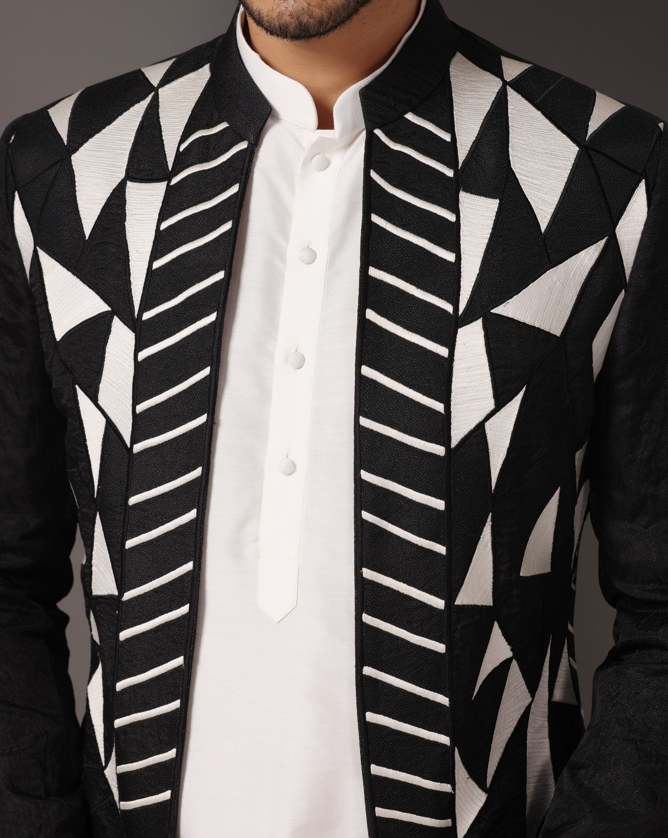 Monochrome Chic: Black Jacket with Thread Embroidery, White Kurta, and Pants