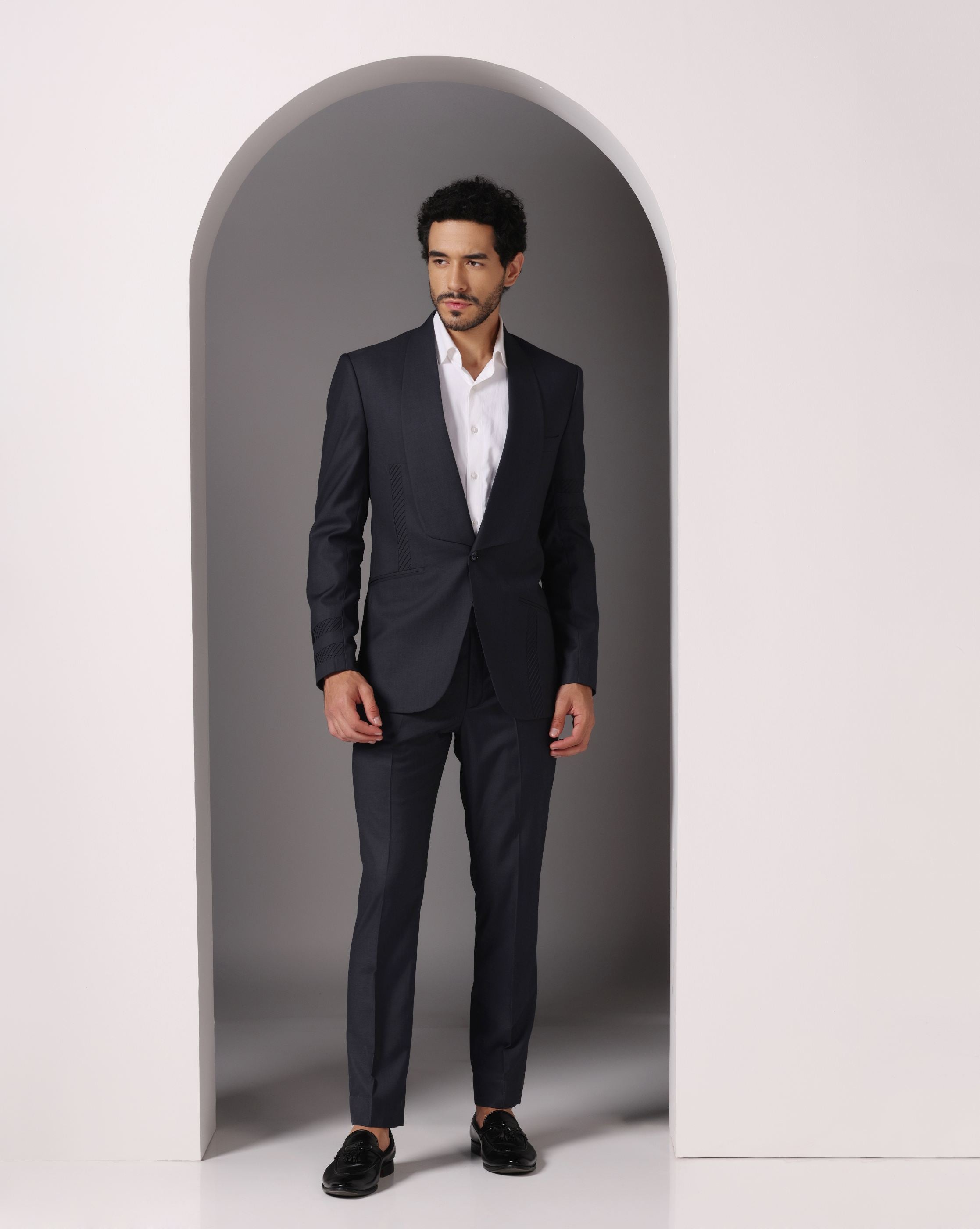 Sapphire Sophistication: Dark Grey Suit with Pintuck Detailing and Tux Lapel