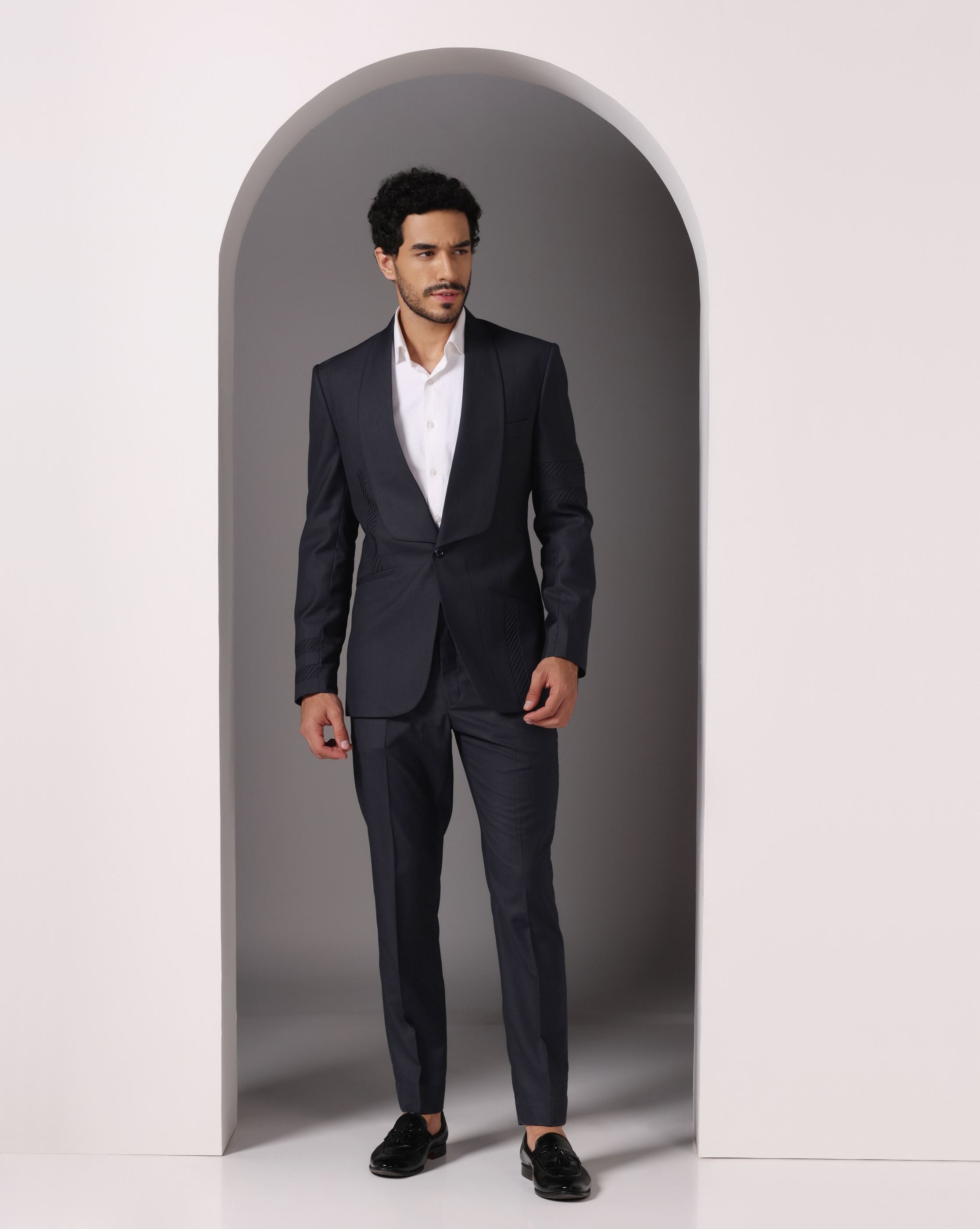 Sapphire Sophistication: Dark Grey Suit with Pintuck Detailing and Tux Lapel