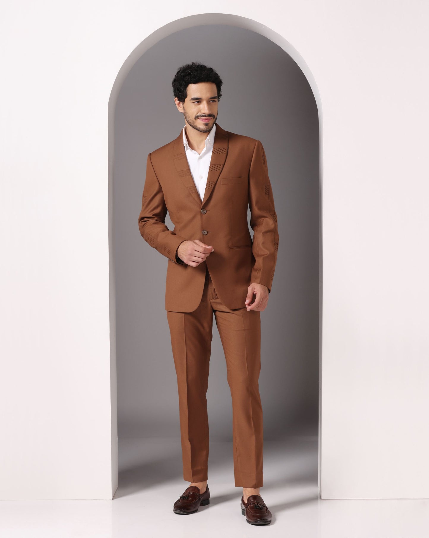 Brown suit with pintuck detailing elevated Indian formal | Bhavya Bhasin Couture