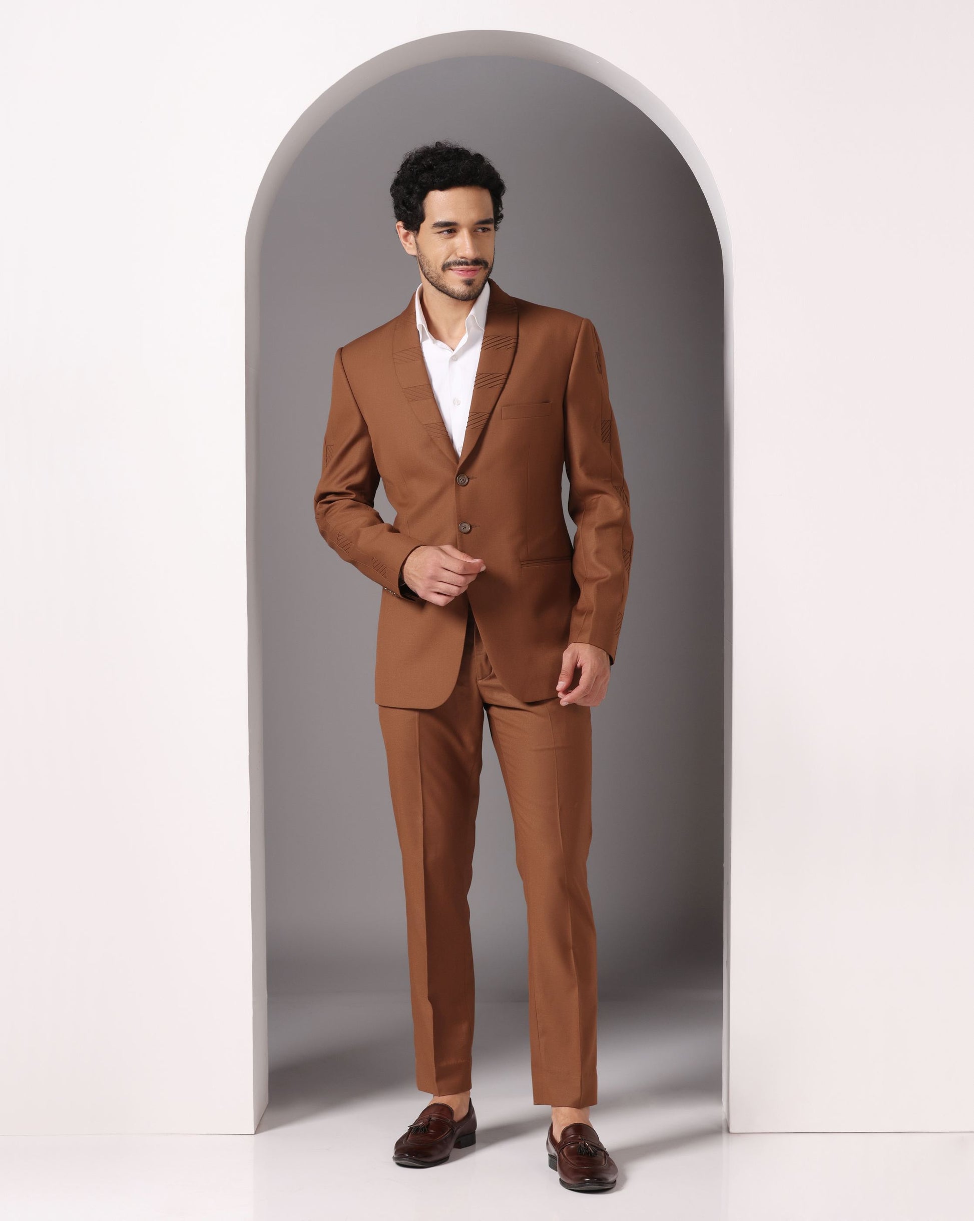 Brown suit with pintuck detailing elevated Indian formal | Bhavya Bhasin Couture
