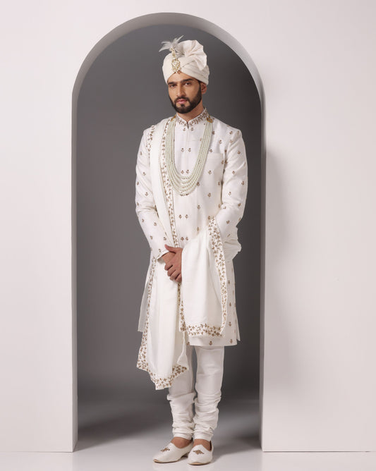 Ivory sherwani with antique gold hand embroidery | Bhavya Bhasin Couture