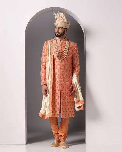 Dark peach thread embroidery groom sherwani set | Bhavya Bhasin Couture