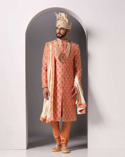 Dark peach thread embroidery groom sherwani set | Bhavya Bhasin Couture