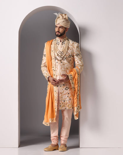 Peach thread hand embroidered sherwani set for groom | Bhavya Bhasin Couture