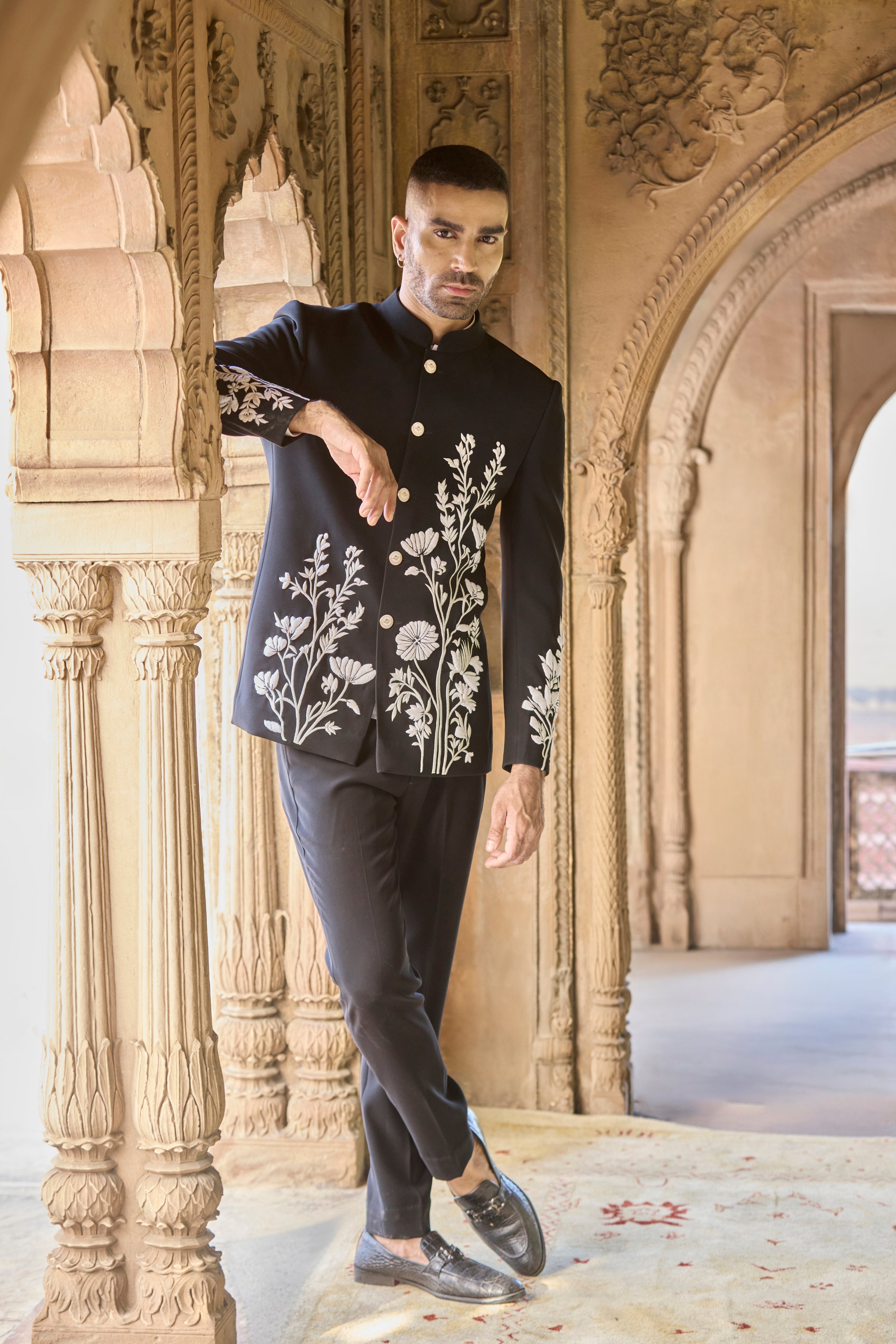 Raas Shvet Vistaar ivory on black bandhgala | Bhavya Bhasin Couture