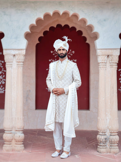 Ivory sherwani with gold hand embroidery groom | Bhavya Bhasin Couture