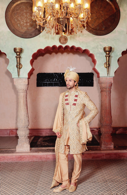 Gold sherwani with hand embroidery statement groom | Bhavya Bhasin Couture