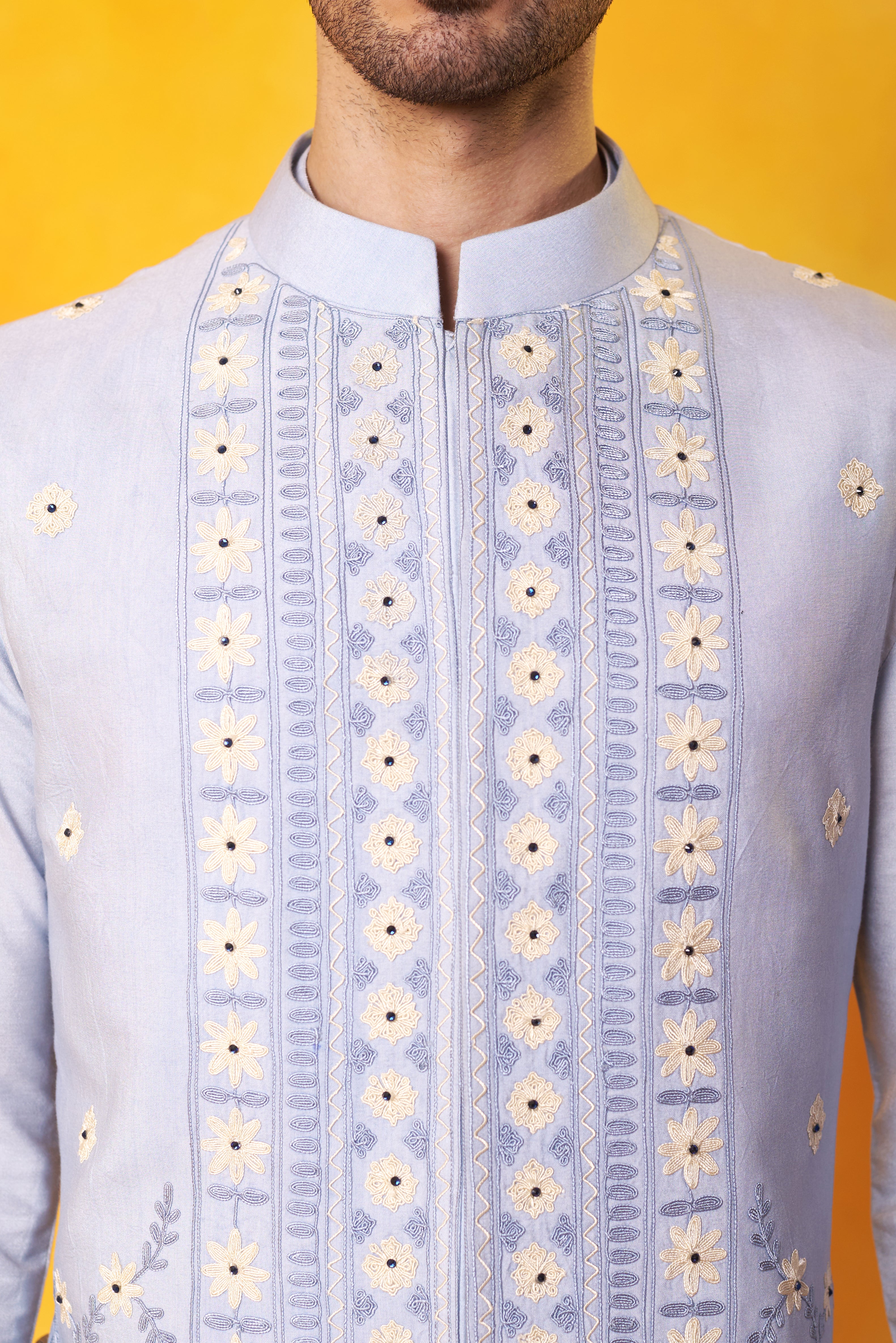 Sky Blue kurta and Nehru Jacket with Dori Embroidery with Ivory Trouser