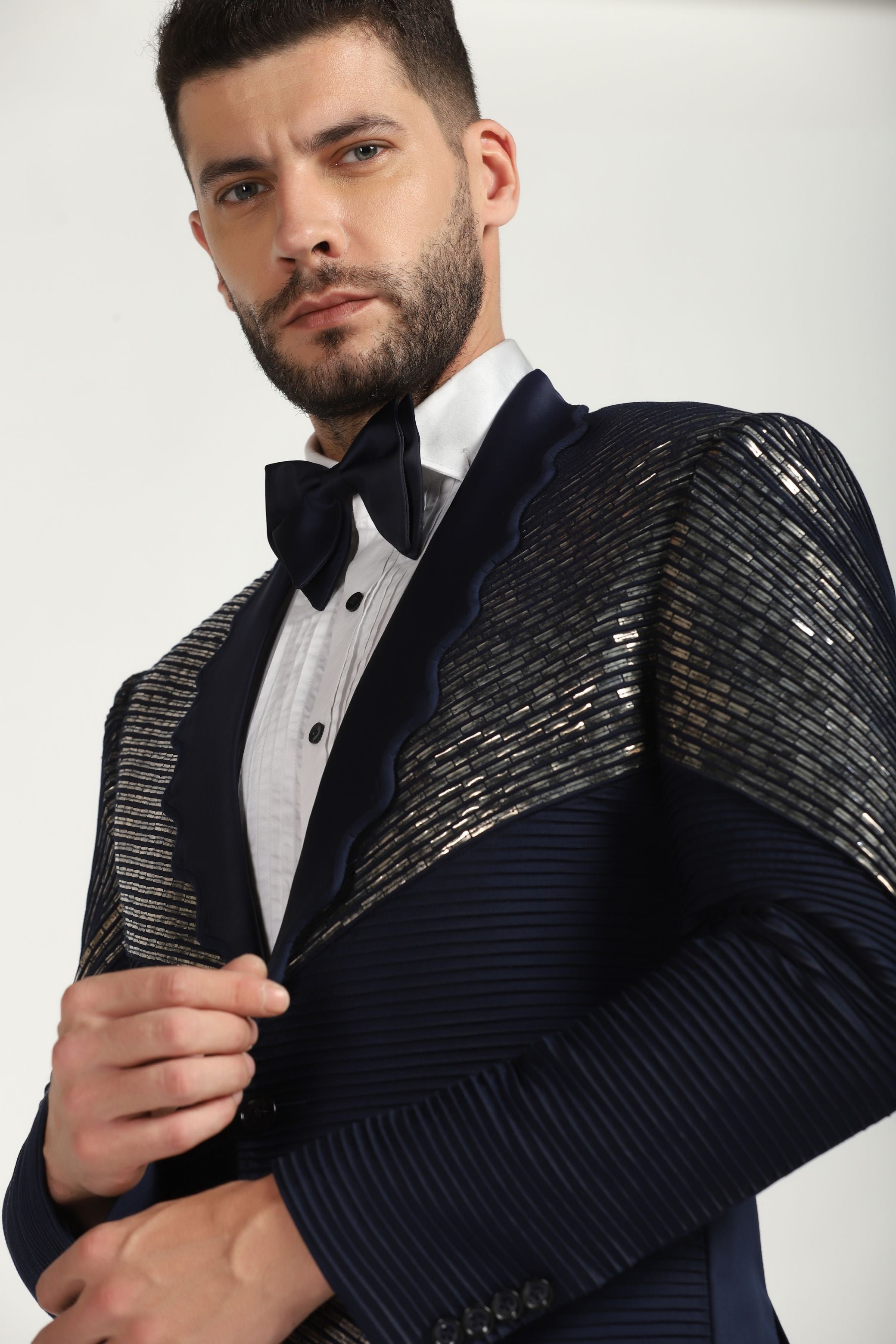 Sapphire Sky Embellished Elegance : Blue Pintucks Embroidered Tuxedo Suit: A Celestial Touch to Contemporary Style