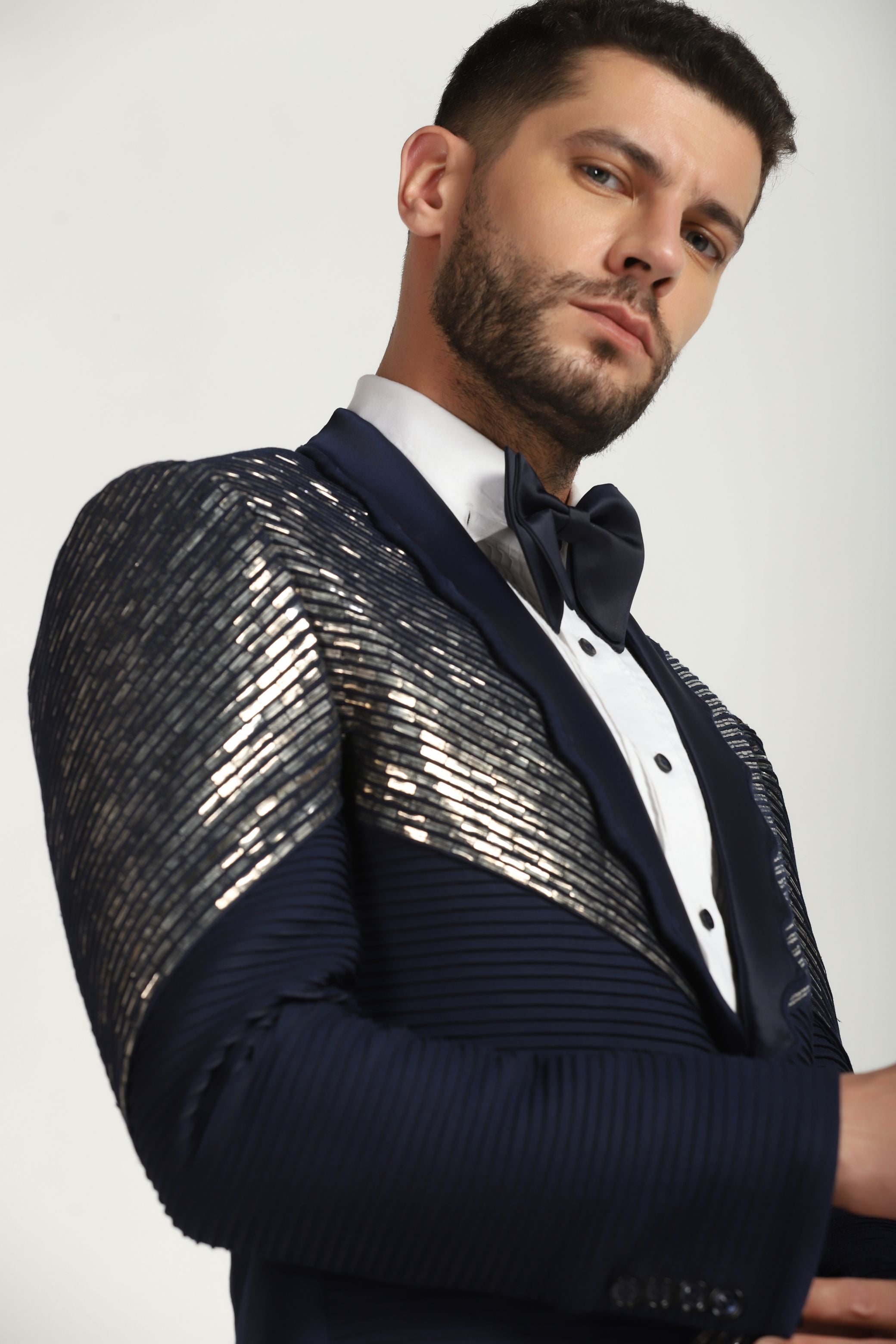 Sapphire Sky Embellished Elegance : Blue Pintucks Embroidered Tuxedo Suit: A Celestial Touch to Contemporary Style