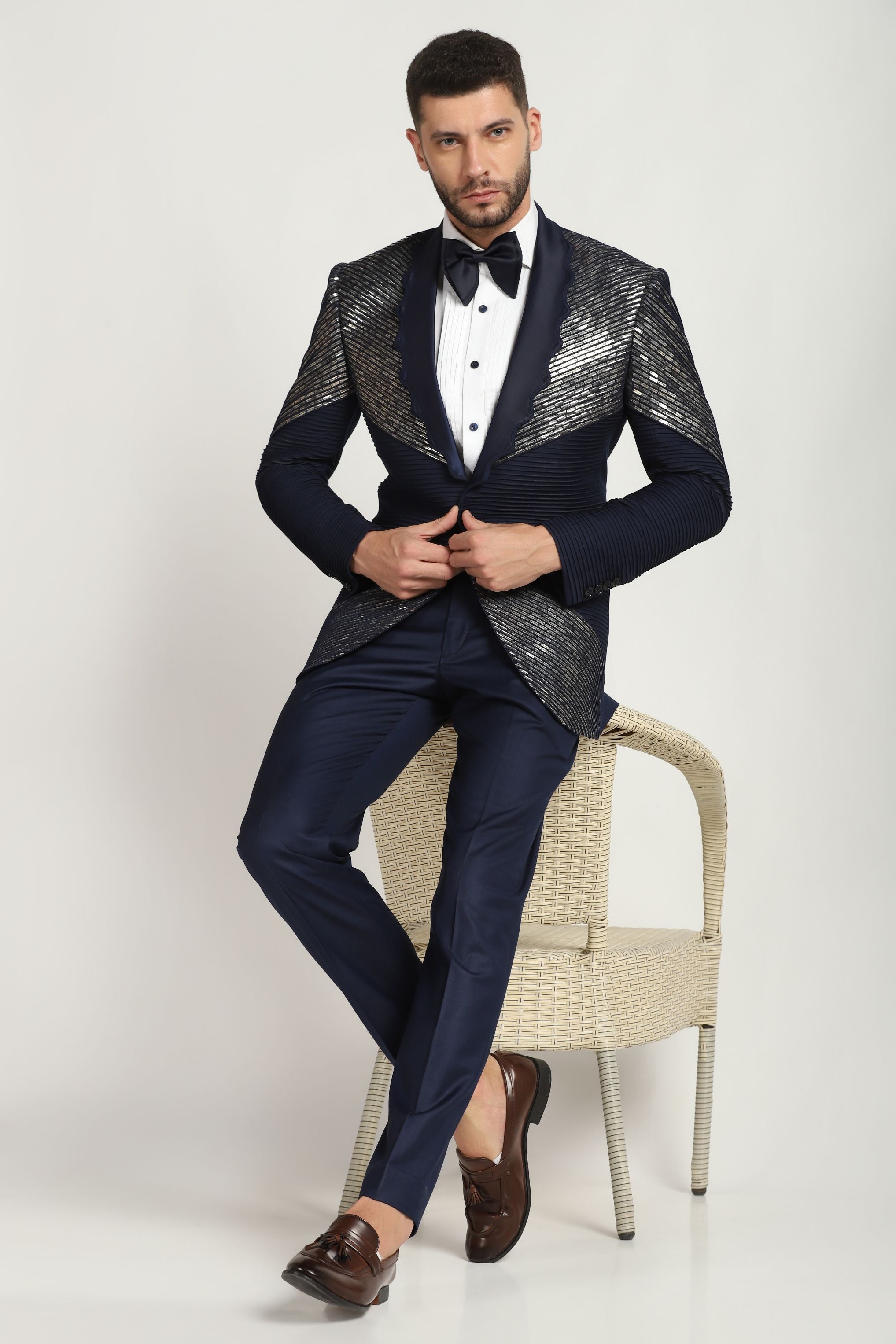 Sapphire Sky Embellished Elegance : Blue Pintucks Embroidered Tuxedo Suit: A Celestial Touch to Contemporary Style