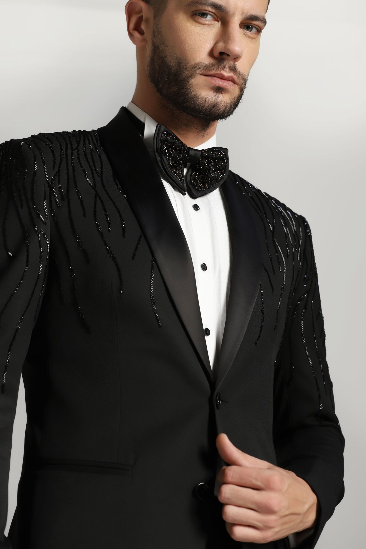 Noir Dazzle Embroidered Tuxedo: Black Elegance Redefined: Cutdaana Embroidery Adorned Tuxedo