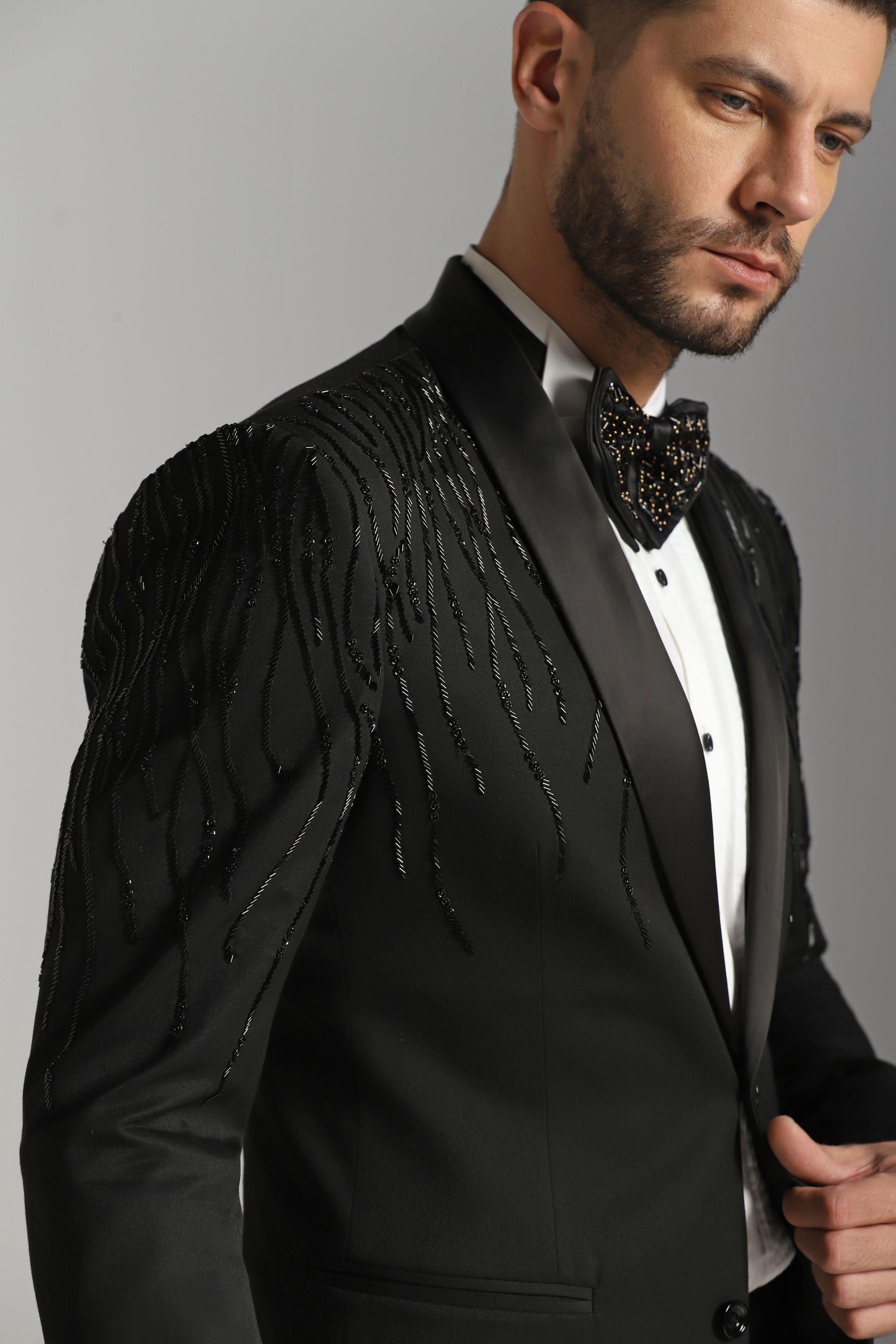 Noir Dazzle Embroidered Tuxedo : Black Elegance Redefined: Cutdaana Embroidery Adorned Tuxedo