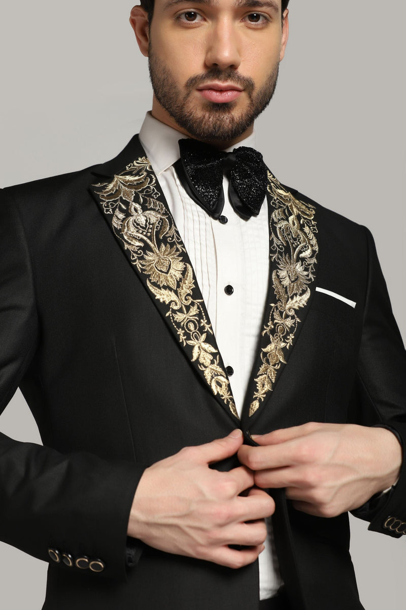 Dapper Black Tuxedo: Your Timeless Statement with a Touch of Gold