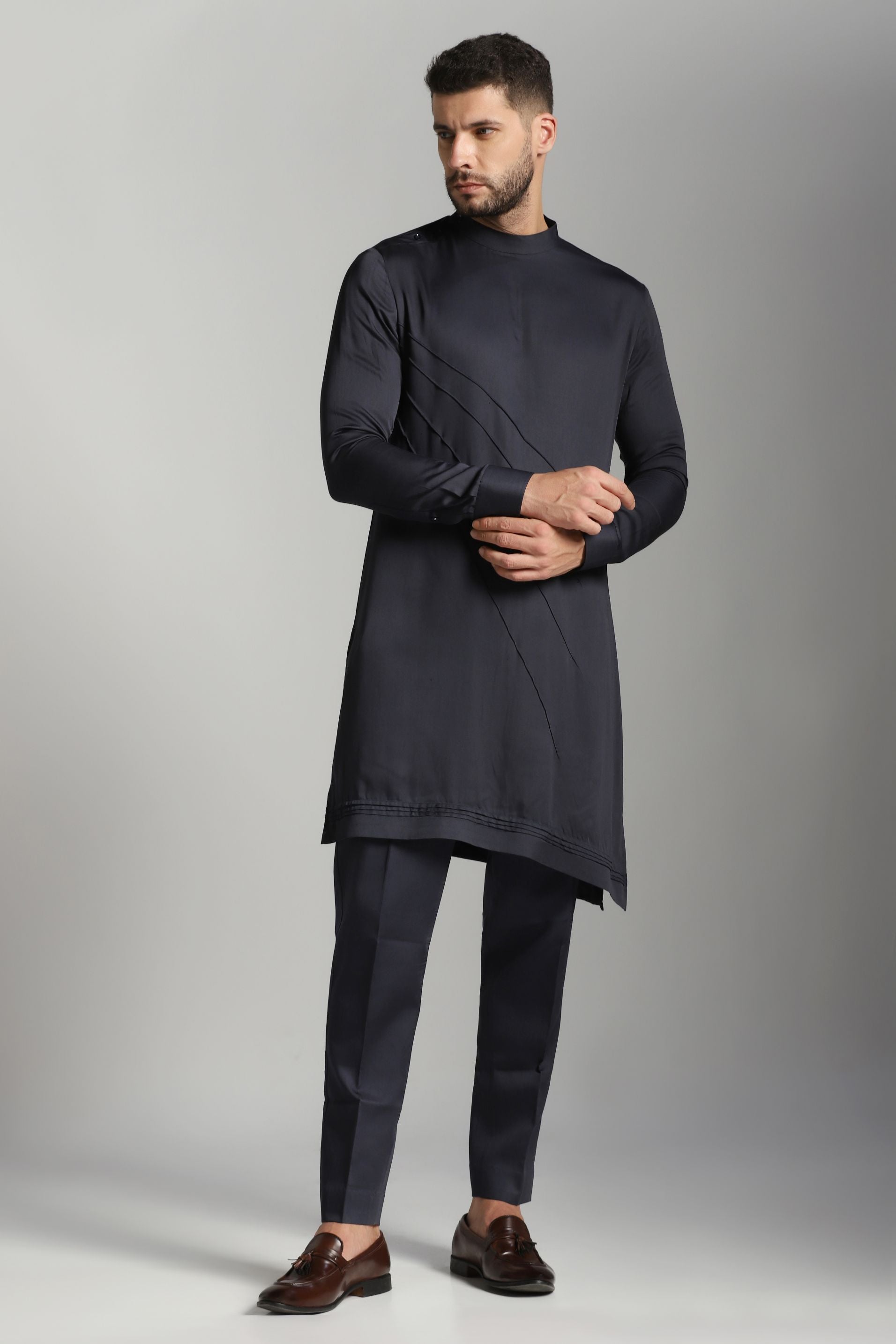 Contemporary Blue Hue: Diagonal Pintucks Kurta paired with Coordinating Trouser