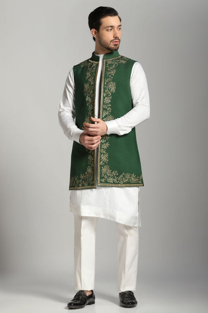 Emerald green long Nehru jacket with ivory asymmetric kurta | Bhavya Bhasin Couture
