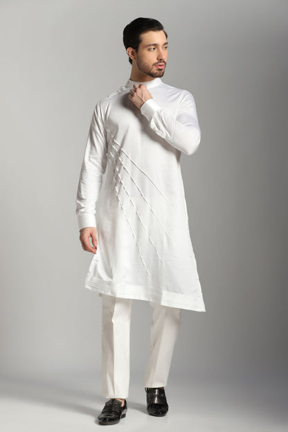 White asymmetric pintuck kurta with trouser Indian wedding | Bhavya Bhasin Couture