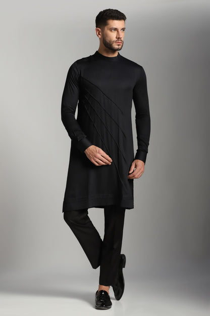 Black asymmetric kurta with matching trouser Indian menswear | Bhavya Bhasin Couture