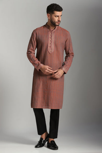 Carrot pink pintuck kurta with black trouser festive | Bhavya Bhasin Couture