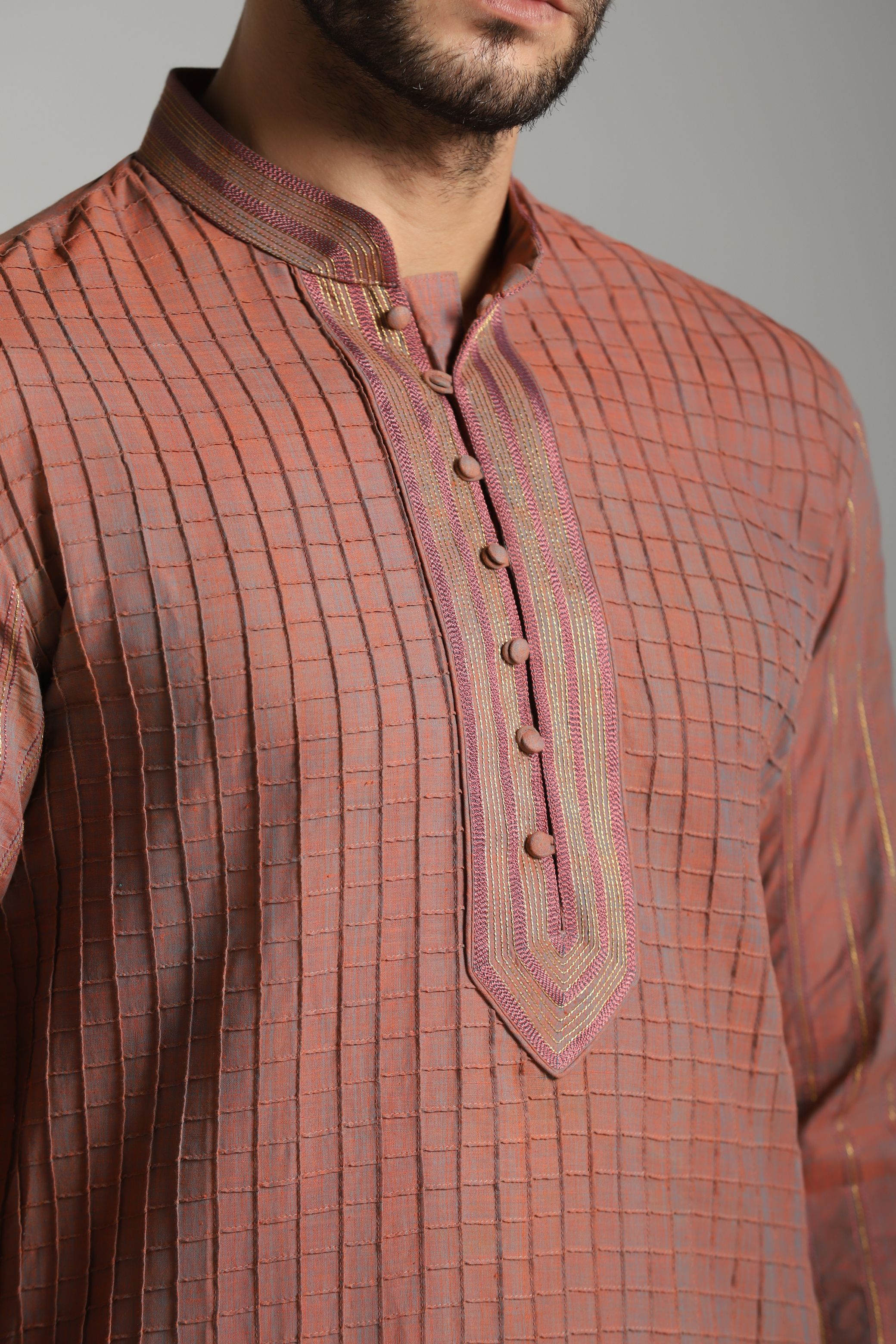 Sunset Radiance: Carrot Pink Pintucks Kurta with Black Trouser