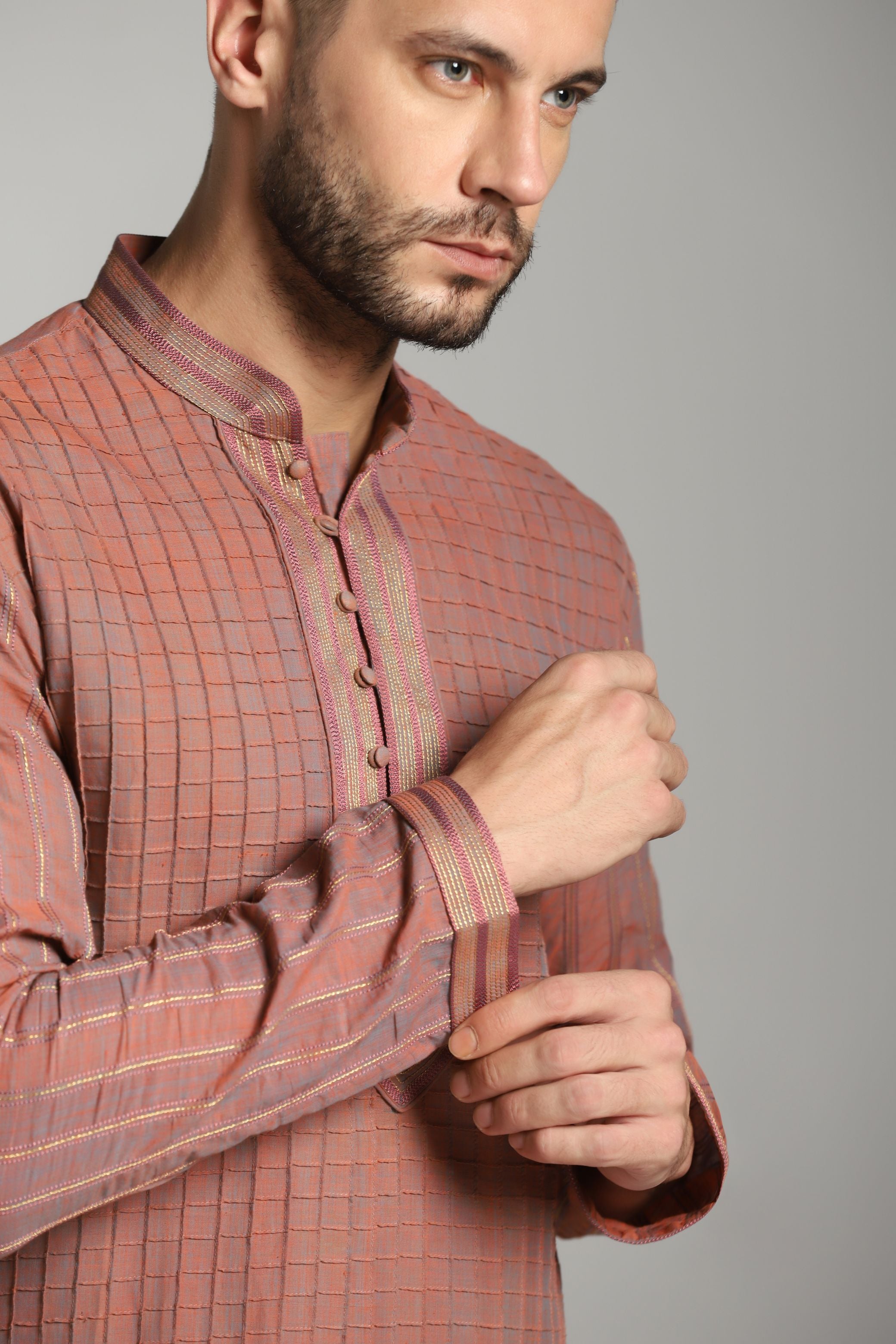 Sunset Radiance: Carrot Pink Pintucks Kurta with Black Trouser