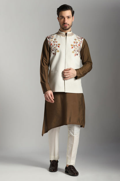 Brown asymmetric kurta with ivory Nehru jacket trouser set | Bhavya Bhasin Couture