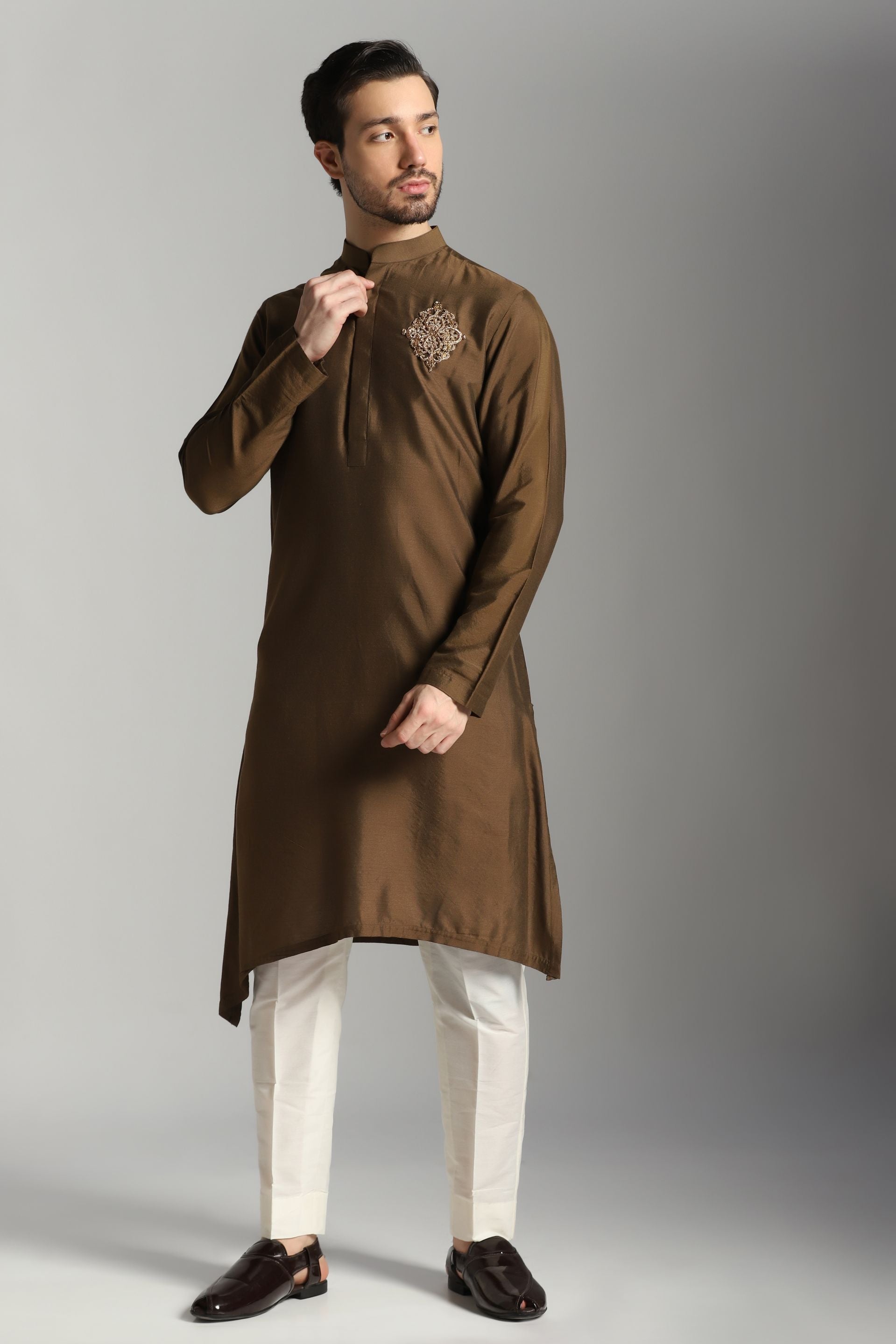 Earthen Elegance: Brown Asymmetric Kurta with Motif and Ivory Trouser