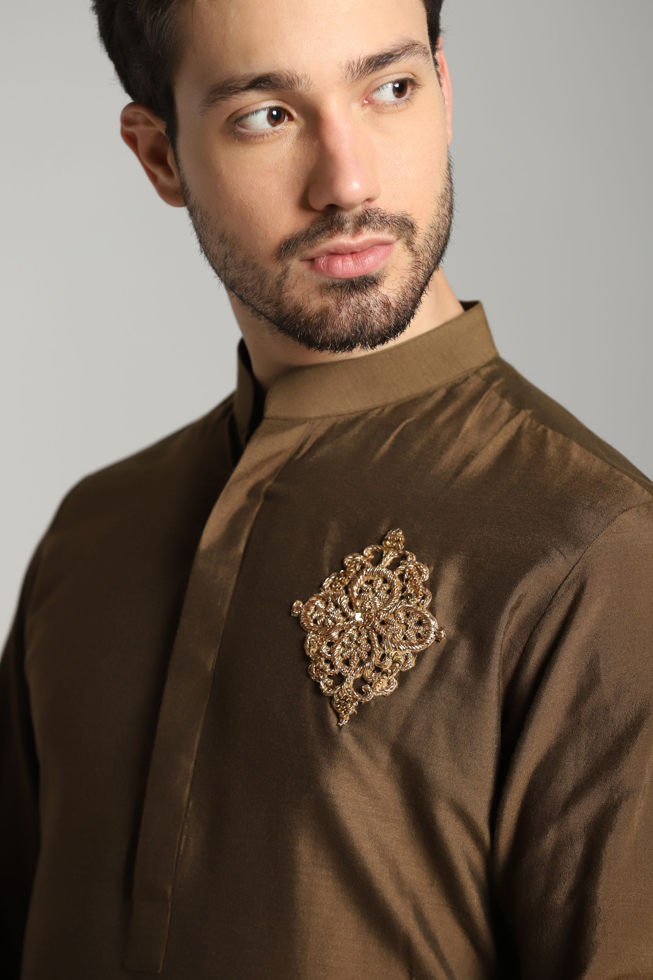 Earthen Elegance: Brown Asymmetric Kurta with Motif and Ivory Trouser